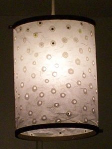 the white shade with the light on